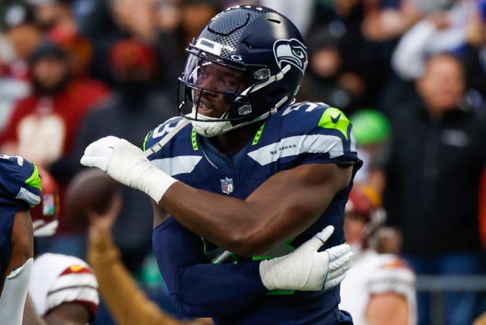 Seattle Seahawks linebacker Boye Mafe (53) celebrates following a sack against the Washington Commanders during the second quarter at Lumen Field.